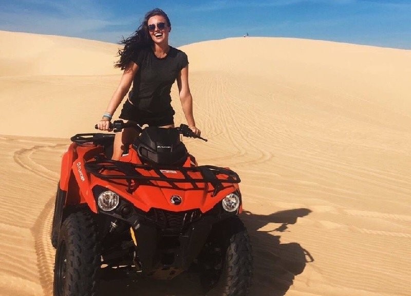 atv in white dunes